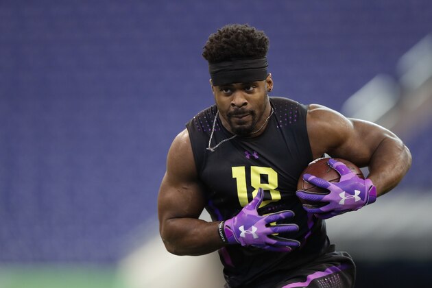 Western Kentucky linebacker Joel Iyiegbuniwe runs a drill at the NFL football scouting combine in Indianapolis, Sunday, March 4, 2018. (AP Photo/Michael Conroy)