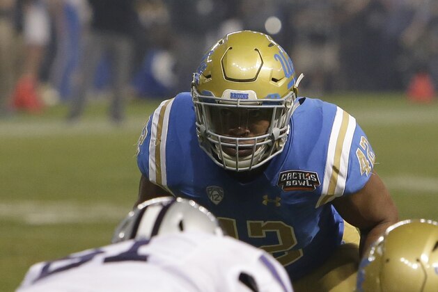 UCLA linebacker Kenny Young (42) in the second half during an NCAA college football bowl game against Kansas State, Tuesday, Dec. 26, 2017, in Phoenix. Kansas State defeated UCLA 35-17. (AP Photo/Rick Scuteri)