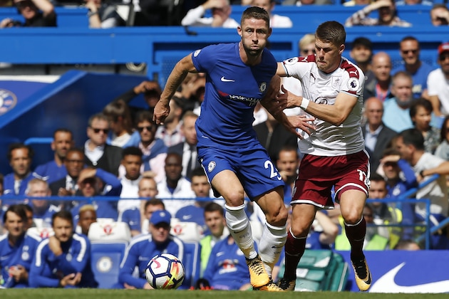 Chelsea's English defender Gary Cahill (L) vies with Burnley's Icelandic midfielder Johann Berg Gudmundsson during the English Premier League football match between Chelsea and Burnley at Stamford Bridge in London on August 12, 2017.
Burnley won the game 3-2. / AFP PHOTO / Ian KINGTON / RESTRICTED TO EDITORIAL USE. No use with unauthorized audio, video, data, fixture lists, club/league logos or 'live' services. Online in-match use limited to 75 images, no video emulation. No use in betting, games or single club/league/player publications. / (Photo credit should read IAN KINGTON/AFP/Getty Images) Chelsea's English defender Gary Cahill (L) vies with Burnley's Icelandic midfielder Johann Berg Gudmundsson during the English Premier League football match between Chelsea and Burnley at Stamford Bridge in London on August 12, 2017.
Burnley won the game 3-2. / AFP PHOTO / Ian KINGTON / RESTRICTED TO EDITORIAL USE. No use with unauthorized audio, video, data, fixture lists, club/league logos or 'live' services. Online in-match use limited to 75 images, no video emulation. No use in betting, games or single club/league/player publications. / (Photo credit should read IAN KINGTON/AFP/Getty Images)