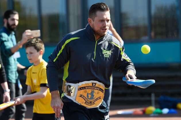 NEWCASTLE UPON-TYNE, ENGLAND - APRIL 20:  WWE superstar The Miz learning how to play cricket at a Chance to Shine coaching session at Ravenswood primary school on April 20, 2016 in Newcastle Upon Tyne, England.  (Photo by Stu Forster/Getty Images)