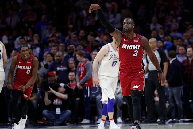 Miami Heat's Dwyane Wade reacts to his basket in the last minute of the second half in Game 2 of a first-round NBA basketball playoff series against the Philadelphia 76ers, Monday, April 16, 2018, in Philadelphia. The Heat won 113-103. (AP Photo/Chris Szagola)