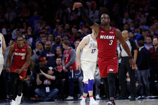 Miami Heat's Dwyane Wade reacts to his basket in the last minute of the second half in Game 2 of a first-round NBA basketball playoff series against the Philadelphia 76ers, Monday, April 16, 2018, in Philadelphia. The Heat won 113-103. (AP Photo/Chris Szagola)