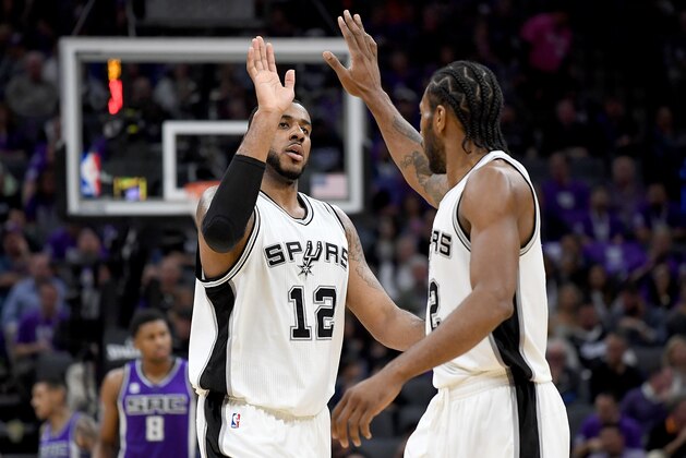 SACRAMENTO, CA - OCTOBER 27: Kawhi Leonard #2 of the San Antonio Spurs is congratulated by LaMarcus Aldridge #12 after Leonard scored a basket against the Sacramento Kings during the second quarter of an NBA basketball game at Golden 1 Center on October 27, 2016 in Sacramento, California. NOTE TO USER: User expressly acknowledges and agrees that, by downloading and or using this photograph, User is consenting to the terms and conditions of the Getty Images License Agreement. (Photo by Thearon W. Henderson/Getty Images) SACRAMENTO, CA - OCTOBER 27: Kawhi Leonard #2 of the San Antonio Spurs is congratulated by LaMarcus Aldridge #12 after Leonard scored a basket against the Sacramento Kings during the second quarter of an NBA basketball game at Golden 1 Center on October 27, 2016 in Sacramento, California. NOTE TO USER: User expressly acknowledges and agrees that, by downloading and or using this photograph, User is consenting to the terms and conditions of the Getty Images License Agreement. (Photo by Thearon W. Henderson/Getty Images)