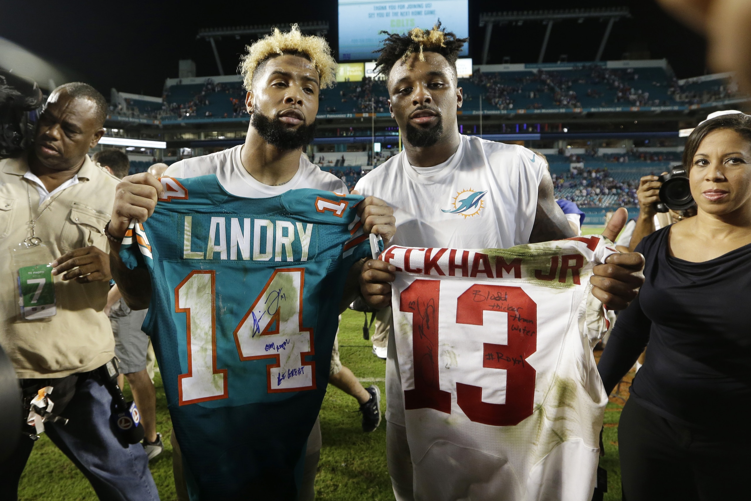 Miami Dolphins wide receiver Jarvis Landry (14) and New York Giants wide receiver Odell Beckham (13) exchange jerseys at the end an NFL football game, Monday, Dec. 14, 2015, in Miami Gardens, Fla. The Giants defeated the Dolphins 31-24. (AP Photo/Lynne Sladky) Miami Dolphins wide receiver Jarvis Landry (14) and New York Giants wide receiver Odell Beckham (13) exchange jerseys at the end an NFL football game, Monday, Dec. 14, 2015, in Miami Gardens, Fla. The Giants defeated the Dolphins 31-24. (AP Photo/Lynne Sladky)