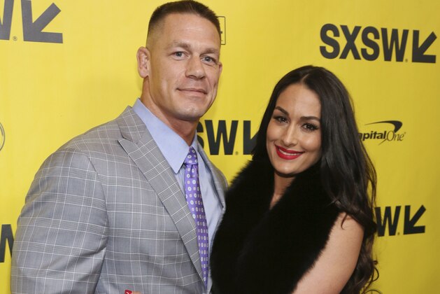 John Cena and his fiancee, Nikki Bella, arrive for the world premiere of