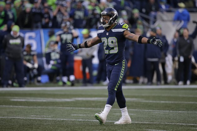 Seattle Seahawks free safety Earl Thomas walks on the field during the first half of an NFL football game against the Arizona Cardinals, Sunday, Dec. 31, 2017, in Seattle. (AP Photo/John Froschauer)