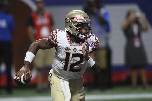 Florida State quarterback Deondre Francois (12) runs against Alabama during the second half of an NCAA football game, Saturday, Sept. 2, 2017, in Atlanta. Alabama won 24-7. (AP Photo/John Bazemore)
