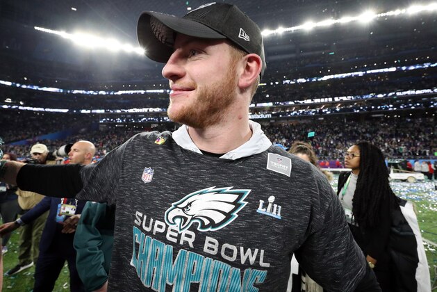 MINNEAPOLIS, MN - FEBRUARY 04:  Carson Wentz #11 of the Philadelphia Eagles celebrates after defeating the New England Patriots 41-33 in Super Bowl LII at U.S. Bank Stadium on February 4, 2018 in Minneapolis, Minnesota.  (Photo by Patrick Smith/Getty Images)