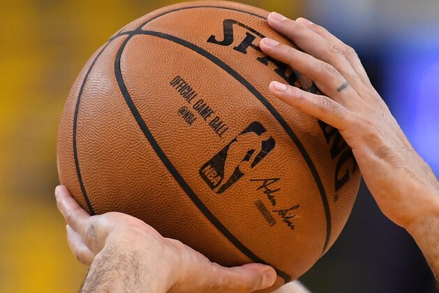 OAKLAND, CA - APRIL 14:  A detailed view of a Spalding NBA basketball shot by Tony Parker #9 of the San Antonio Spurs while he warms up prior to playing the Golden State Warriors in Game One of the first round of the 2018 NBA Playoff at ORACLE Arena on April 14, 2018 in Oakland, California. NOTE TO USER: User expressly acknowledges and agrees that, by downloading and or using this photograph, User is consenting to the terms and conditions of the Getty Images License Agreement.  (Photo by Thearon W. Henderson/Getty Images)