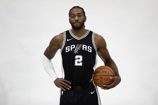 San Antonio Spurs forward Kawhi Leonard (2) takes part in media day at the team's facility, Monday, Sept. 25, 2017, in San Antonio. (AP Photo/Eric Gay)