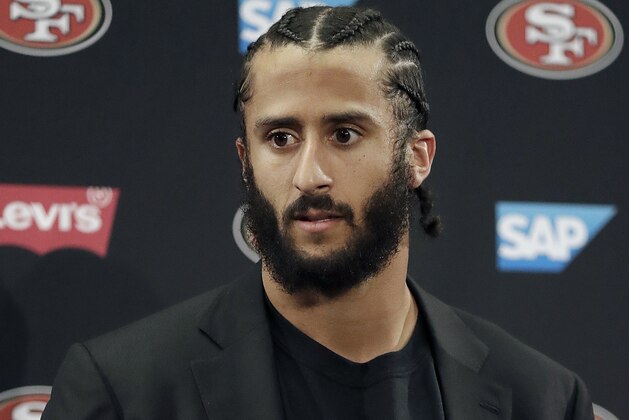 FILE - This Jan. 1, 2017, file photo shows then San Francisco 49ers quarterback Colin Kaepernick speaking at a news conference after the team's NFL football game against the Seattle Seahawks in Santa Clara, Calif. NFL spokesman Joe Lockhart says the league expects Colin Kaepernick to be invited to the next meeting between owners and players to discuss social justice initiatives. Lockhart adds that the meeting probably will take place next week. (AP Photo/Marcio Jose Sanchez, File)