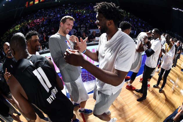JOHANNESBURG, SOUTH AFRICA - AUGUST 5: Dirk Nowitzki #41 of Team World shakes hands with Joel Embiid #21 of Team Africa in the 2017 Africa Game as part of the Basketball Without Borders Africa at the Ticketpro Dome on August 5, 2017 in Gauteng province of Johannesburg, South Africa. NOTE TO USER: User expressly acknowledges and agrees that, by downloading and or using this photograph, User is consenting to the terms and conditions of the Getty Images License Agreement. Mandatory Copyright Notice: Copyright 2017 NBAE (Photo by Andrew D. Bernstein/NBAE via Getty Images) JOHANNESBURG, SOUTH AFRICA - AUGUST 5: Dirk Nowitzki #41 of Team World shakes hands with Joel Embiid #21 of Team Africa in the 2017 Africa Game as part of the Basketball Without Borders Africa at the Ticketpro Dome on August 5, 2017 in Gauteng province of Johannesburg, South Africa. NOTE TO USER: User expressly acknowledges and agrees that, by downloading and or using this photograph, User is consenting to the terms and conditions of the Getty Images License Agreement. Mandatory Copyright Notice: Copyright 2017 NBAE (Photo by Andrew D. Bernstein/NBAE via Getty Images)