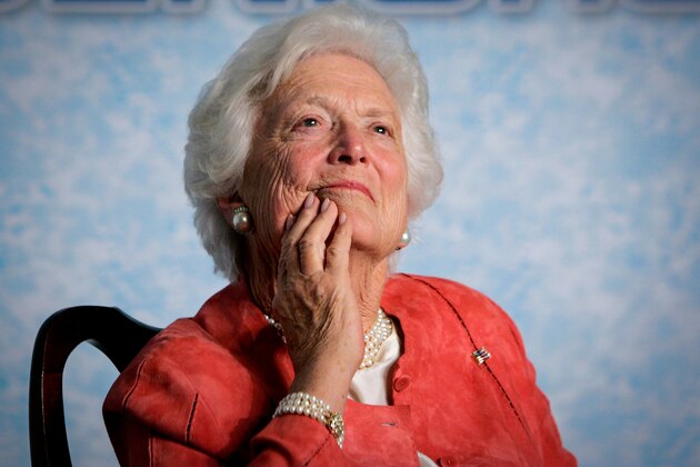 In this file photo from Friday, March 18, 2005, former first lady Barbara Bush listens to her son, President George W. Bush, as he speaks on Social Security reform in Orlando, Fla. The wife of former President George H.W. Bush is in