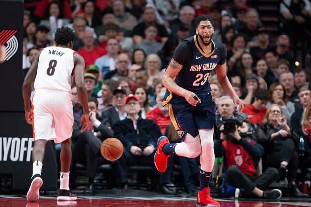 New Orleans Pelicans forward Anthony Davis reacts after a score against the Portland Trail Blazers during the second half in Game 1 of an NBA basketball first-round playoff series Saturday, April 14, 2018, in Portland, Ore. New Orleans won, 97-95. (AP Photo/Randy L. Rasmussen)