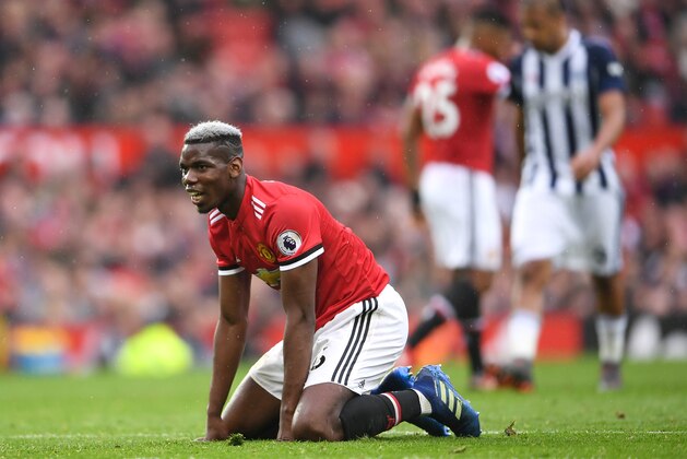 MANCHESTER, ENGLAND - APRIL 15:  Paul Pogba of Manchester United reacts during the Premier League match between Manchester United and West Bromwich Albion at Old Trafford on April 15, 2018 in Manchester, England.  (Photo by Laurence Griffiths/Getty Images)