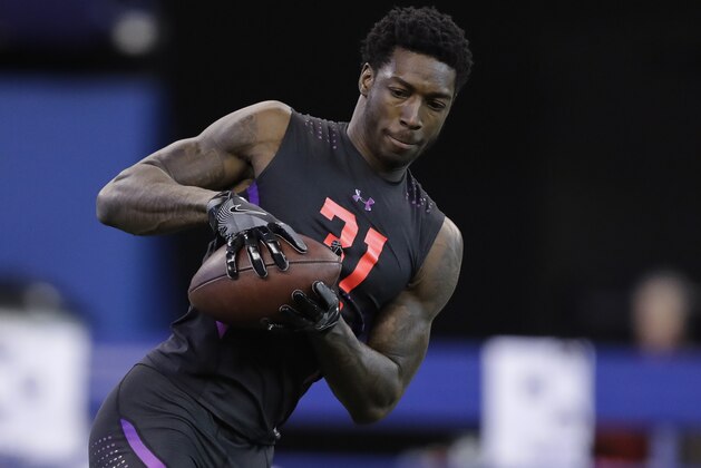 Alabama wide receiver Calvin Ridley runs a drill during the NFL football scouting combine, Saturday, March 3, 2018, in Indianapolis. (AP Photo/Darron Cummings)