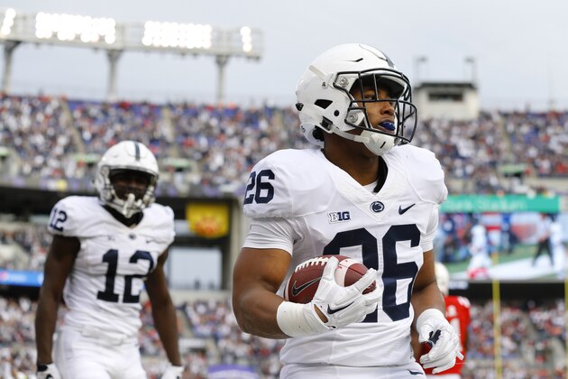 Penn State running back Saquon Barkley, right, runs into the end zone for a touchdown in the first half of an NCAA college football game against Maryland, Saturday, Oct. 24, 2015, in Baltimore. (AP Photo/Patrick Semansky)