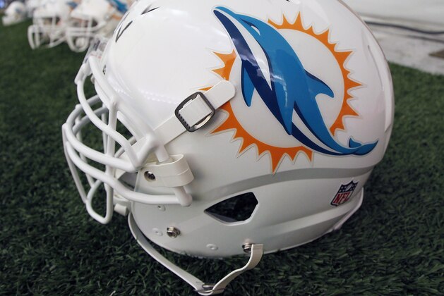 DAVIE, FL - MAY 03:  The Miami Dolphins new logo is displayed on a helmet during rookie camp on May 3, 2013 at the Miami Dolphins training facility in Davie, Florida.  (Photo by Joel Auerbach/Getty Images)