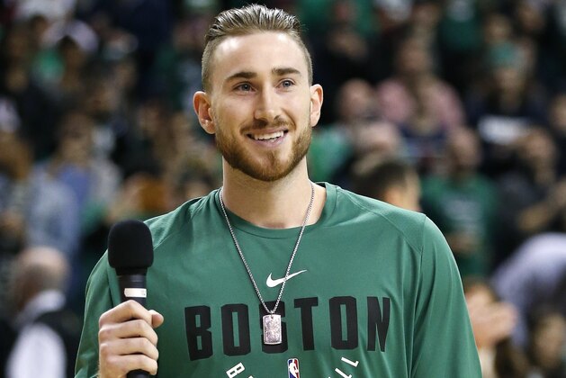 Boston Celtics Gordon Hayward addresses the crowd before an NBA basketball game against the Washington Wizards in Boston, Monday, Dec. 25, 2017. (AP Photo/Michael Dwyer)