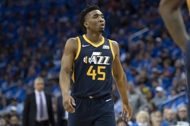 OKLAHOMA CITY, OK - APRIL 15: Donovan Mitchell #45 of the Utah Jazz watches game action against the Oklahoma City Thunder during the second half of  Game One of the Western Conference in the 2018 NBA Playoffs at the Chesapeake Energy Arena on April 15, 2018 in Oklahoma City, Oklahoma. NOTE TO USER: User expressly acknowledges and agrees that, by downloading and or using this photograph, User is consenting to the terms and conditions of the Getty Images License Agreement. (Photo by J Pat Carter/Getty Images) *** Local Caption *** Donovan Mitchell;
