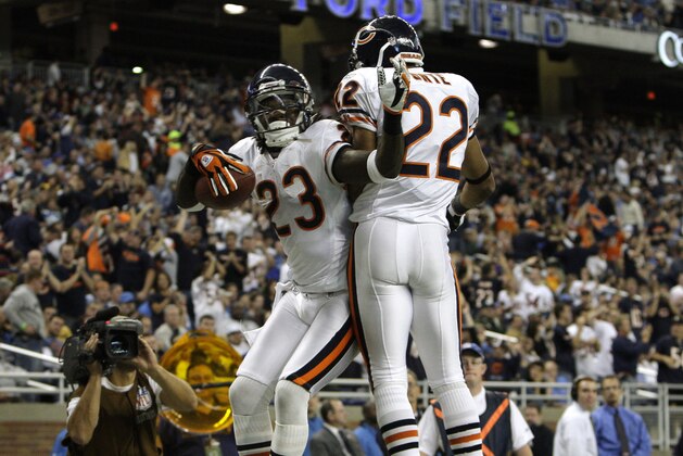 Chicago Bears wide receiver Devin Hester (23) celebrates his twelve-yard touchdown-reception with running back Matt Forte (22) against the Detroit Lions in the second quarter of an NFL football game in Detroit, Sunday, Oct. 5, 2008. (AP Photo/Paul Sancya)