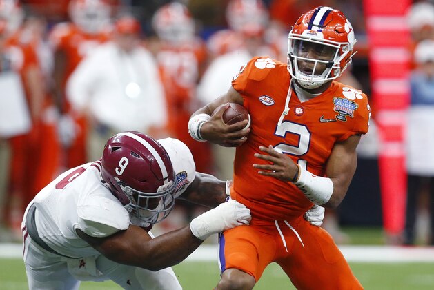 Clemson quarterback Kelly Bryant (2) is sacked by Alabama defensive lineman Da'Shawn Hand (9) in the second half of the Sugar Bowl semi-final playoff game for the NCAA college football national championship, in New Orleans, Monday, Jan. 1, 2018. (AP Photo/Butch Dill)