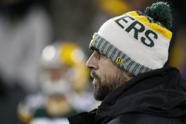 Green Bay Packers' Aaron Rodgers watches warm up before an NFL football game against the Minnesota Vikings Saturday, Dec. 23, 2017, in Green Bay, Wis. (AP Photo/Mike Roemer)