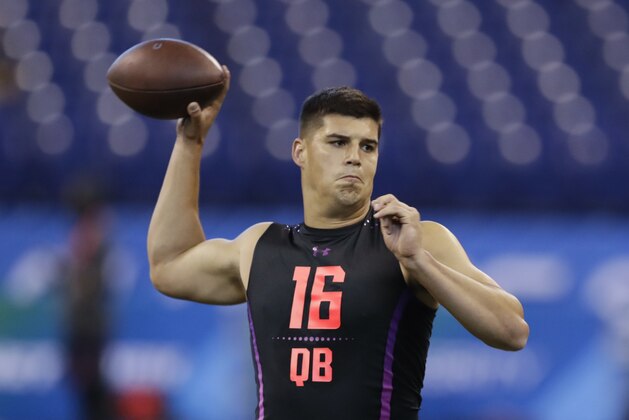 Oklahoma State quarterback Mason Rudolph throws during a drill at the NFL football scouting combine, Saturday, March 3, 2018, in Indianapolis. (AP Photo/Darron Cummings)