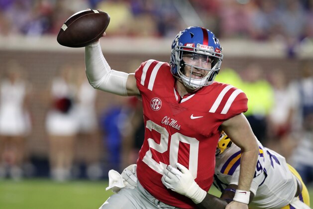 Mississippi quarterback Shea Patterson (20) is sacked by LSU linebacker Arden Key (49) in the second half of an NCAA college football game in Oxford, Miss., Saturday, Oct. 21, 2017. No. 24 LSU won 40-24. (AP Photo/Rogelio V. Solis)