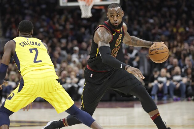 Cleveland Cavaliers' LeBron James (23) drives around Indiana Pacers' Darren Collison (2) in the first half of Game 1 of an NBA basketball first-round playoff series, Sunday, April 15, 2018, in Cleveland. (AP Photo/Tony Dejak) Cleveland Cavaliers' LeBron James (23) drives around Indiana Pacers' Darren Collison (2) in the first half of Game 1 of an NBA basketball first-round playoff series, Sunday, April 15, 2018, in Cleveland. (AP Photo/Tony Dejak)
