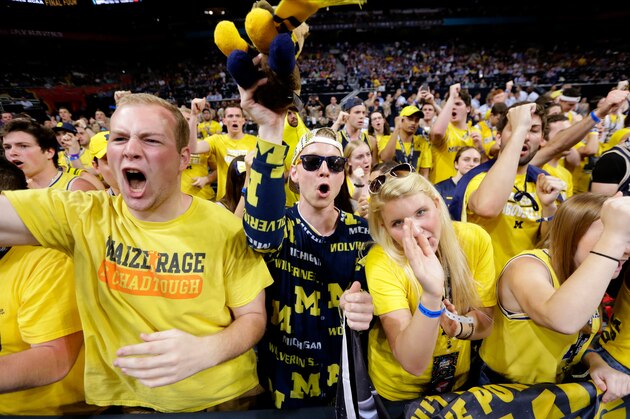 Michigan fans cheer before the championship game against Villanova in the Final Four NCAA college basketball tournament, Monday, April 2, 2018, in San Antonio. (AP Photo/Eric Gay)