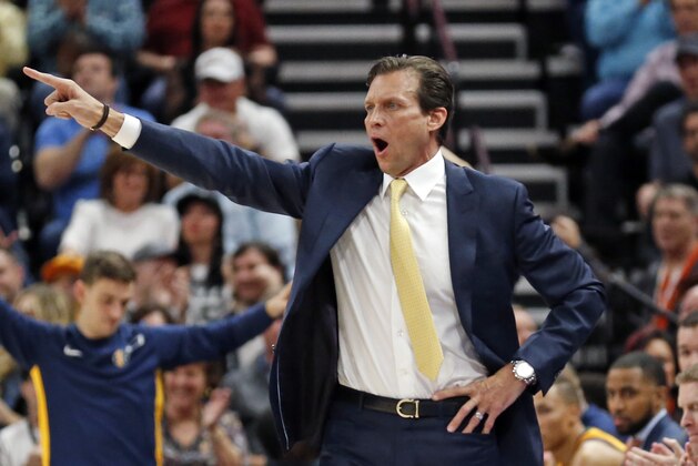 Utah Jazz head coach Quin Snyder shouts to his team in the first half during an NBA basketball game against the Los Angeles Clippers, Thursday, April 5, 2018, in Salt Lake City. (AP Photo/Rick Bowmer)