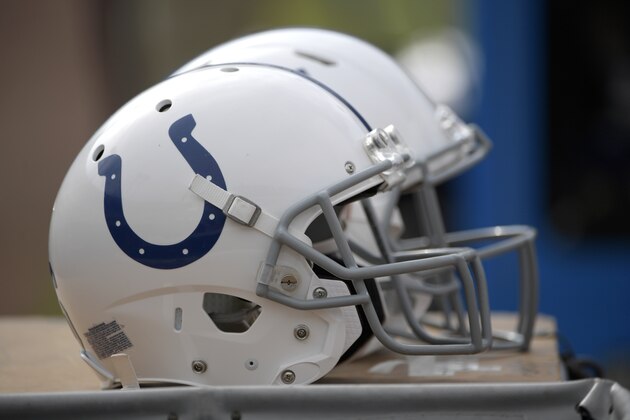 Indianapolis Colts helmets sit behind the bench during the first half of an NFL football game against the Jacksonville Jaguars Sunday, Dec. 3, 2017, in Jacksonville, Fla. (AP Photo/Phelan M. Ebenhack)
