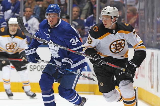 TORONTO, ON - APRIL 16:  Charlie McAvoy #73 of the Boston Bruins skates against Auston Matthews #34 of the Toronto Maple Leafs in Game Three of the Eastern Conference First Round during the 2018 Stanley Cup Play-offs at the Air Canada Centre on April 16, 2018 in Toronto, Ontario, Canada. (Photo by Claus Andersen/Getty Images)