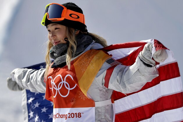 Chloe Kim, of the United States, celebrates winning gold after the women's halfpipe finals at Phoenix Snow Park at the 2018 Winter Olympics in Pyeongchang, South Korea, Tuesday, Feb. 13, 2018. (AP Photo/Gregory Bull)