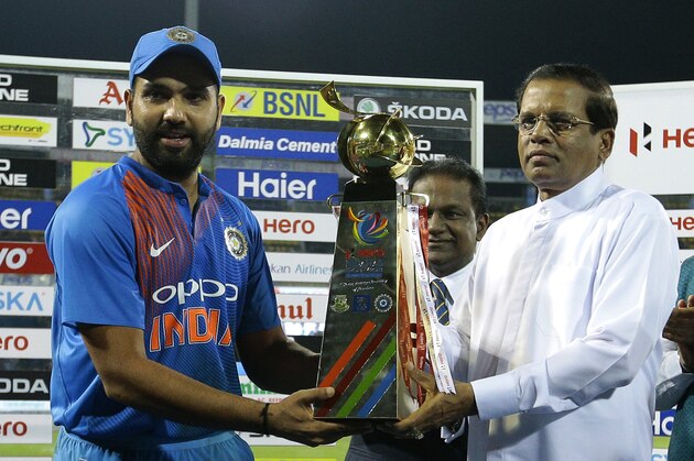 India's captain Virat Kohli receives the Nidahas triangular Twenty20 cricket series champion's trophy from Sri Lankan President Maithripala Sirisena in Colombo, Sri Lanka, Sunday, March 18, 2018, after his team won against Bangladesh. (AP Photo/Eranga Jayawardena) India's captain Virat Kohli receives the Nidahas triangular Twenty20 cricket series champion's trophy from Sri Lankan President Maithripala Sirisena in Colombo, Sri Lanka, Sunday, March 18, 2018, after his team won against Bangladesh. (AP Photo/Eranga Jayawardena)