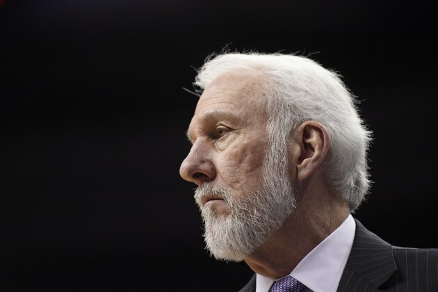 San Antonio Spurs head coach Gregg Popovich watches during the first half of an NBA basketball game against the Washington Wizards, Tuesday, March 27, 2018, in Washington. (AP Photo/Nick Wass)