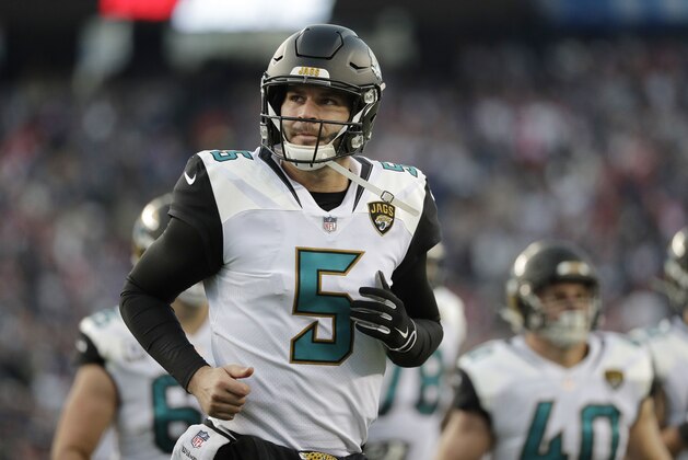 Jacksonville Jaguars quarterback Blake Bortles runs to the locker room after the first half of the AFC championship NFL football game against the New England Patriots, Sunday, Jan. 21, 2018, in Foxborough, Mass. (AP Photo/David J. Phillip)
