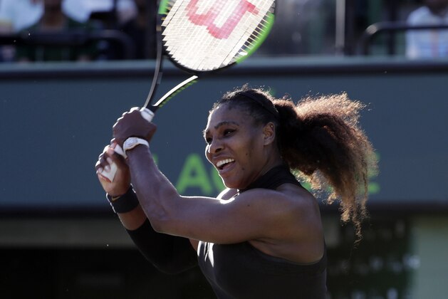Serena Williams returns to Naomi Osaka of Japan, during the Miami Open tennis tournament, Wednesday, March 21, 2018, in Key Biscayne, Fla. Osaka won 6-3, 6-2. (AP Photo/Lynne Sladky)