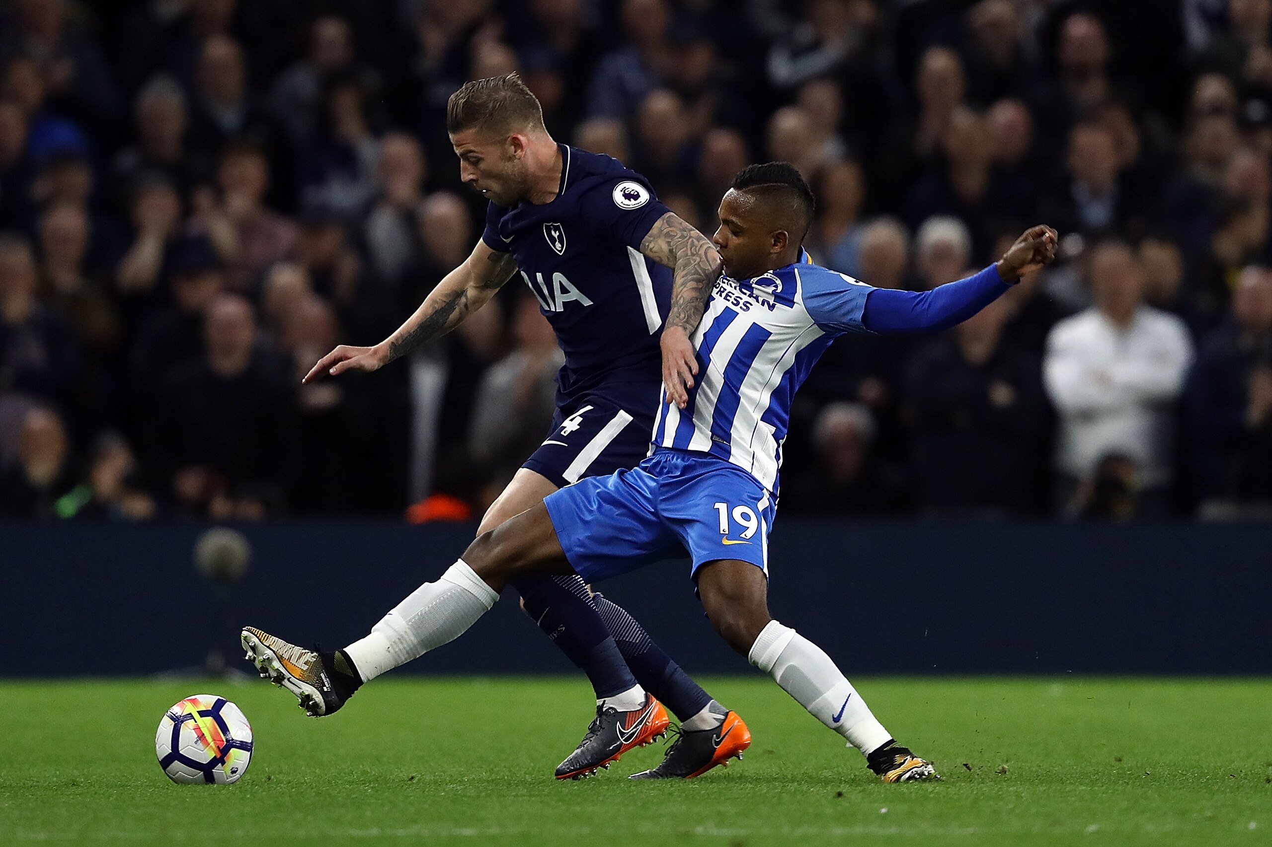 BRIGHTON, ENGLAND - APRIL 17:  Jose Izquierdo of Brighton & Hove Albion tackles Toby Alderweireld of Tottenham Hoptspur during the Premier League match between Brighton and Hove Albion and Tottenham Hotspur at Amex Stadium on April 17, 2018 in Brighton, England.  (Photo by Bryn Lennon/Getty Images)