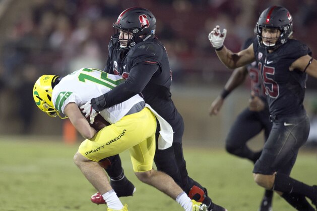 Stanford's Harrison Phillips (66) sacks Oregon's quarterback Taylor Alie (12) during the fourth quarter of an NCAA college football game, Saturday, Oct. 14, 2017, in Stanford, Calif. Stanford won 49-7. (AP Photo/D. Ross Cameron)