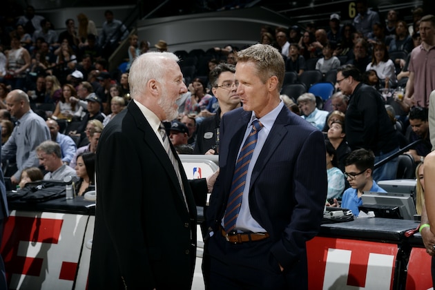 SAN ANTONIO, TX - APRIL 5: Gregg Popovich of the San Antonio Spurs and Steve Kerr of the Golden State Warriors speak before a game on April 5, 2015 at the AT&T Center in San Antonio, Texas. NOTE TO USER: User expressly acknowledges and agrees that, by downloading and or using this Photograph, user is consenting to the terms and conditions of the Getty Images License Agreement. Mandatory Copyright Notice: Copyright 2015 NBAE (Photo by D. Clarke Evans/NBAE via Getty Images)