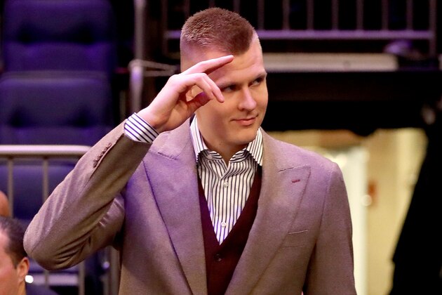 NEW YORK, NY - MARCH 13:  Kristaps Porzingis #6 of the New York Knicks is welcomed back after tearing his ACL previously in the season prior to taking on the Dallas Mavericks during their game at Madison Square Garden on March 13, 2018 in New York City. NOTE TO USER: User expressly acknowledges and agrees that, by downloading and or using this photograph, User is consenting to the terms and conditions of the Getty Images License Agreement.  (Photo by Abbie Parr/Getty Images)
