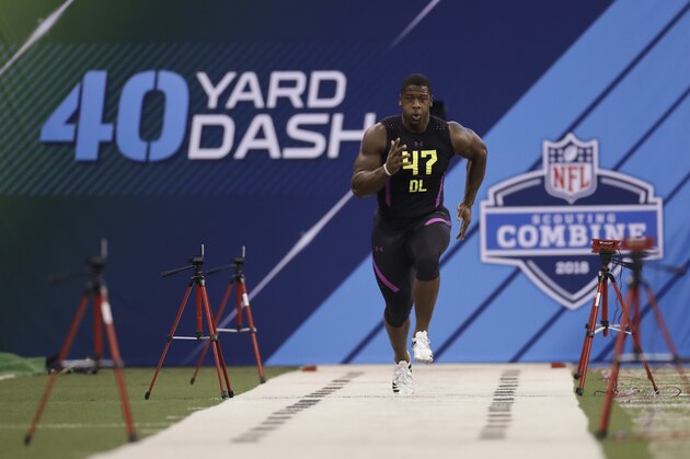 North Carolina State defensive lineman Kentavius Street runs the 40-yard dash during the NFL football scouting combine, Sunday, March 4, 2018, in Indianapolis. (AP Photo/Darron Cummings)