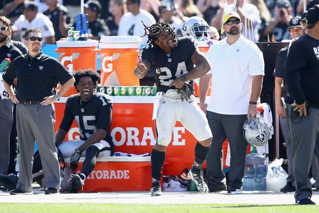 OAKLAND, CA - SEPTEMBER 17:  Marshawn Lynch #24 of the Oakland Raiders dances on the sideline during their win over the New York Jets at Oakland-Alameda County Coliseum on September 17, 2017 in Oakland, California.  (Photo by Ezra Shaw/Getty Images)