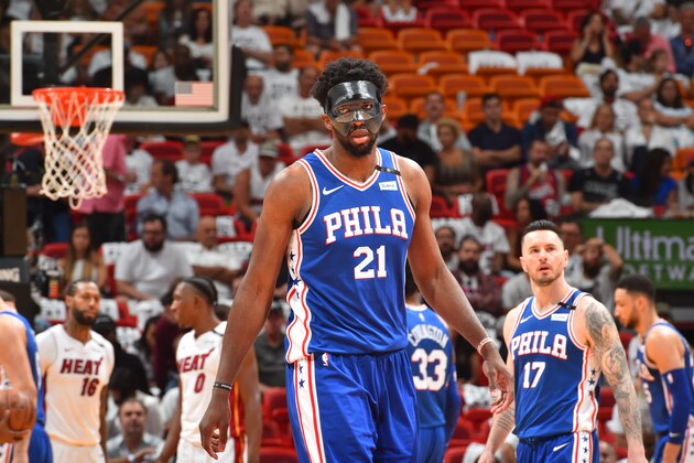 MIAMI, FL - APRIL 19:  Joel Embiid #21 of the Philadelphia 76ers looks on during the game against the Miami Heat in Game Three of Round One of the 2018 NBA Playoffs on April 19, 2018 at American Airlines Arena in Miami, Florida. NOTE TO USER: User expressly acknowledges and agrees that, by downloading and or using this Photograph, user is consenting to the terms and conditions of the Getty Images License Agreement. Mandatory Copyright Notice: Copyright 2018 NBAE (Photo by Jesse D. Garrabrant/NBAE via Getty Images)