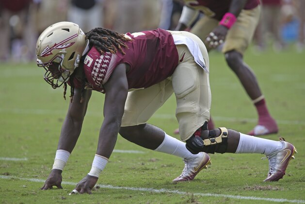 Florida State's Josh Sweat lines up at the start of a play during an NCAA college football game with Miami, Saturday, Oct. 7, 2017, in Tallahassee, Fla. Miami won 24-20. (AP Photo/Steve Cannon)