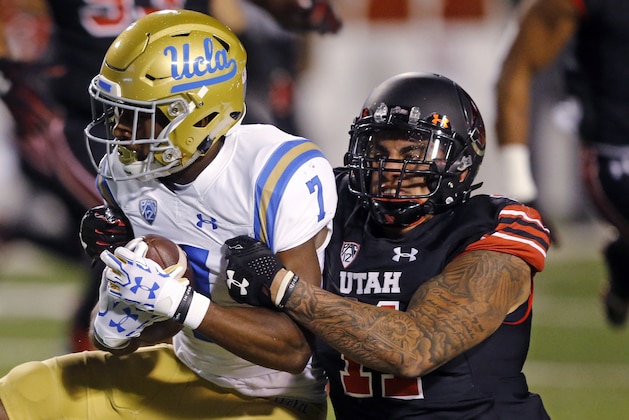 Utah defensive end Kylie Fitts (11) tackles UCLA wide receiver Darren Andrews (7) during the first half of an NCAA college football game Friday, Nov. 3, 2017, in Salt Lake City. (AP Photo/Rick Bowmer)