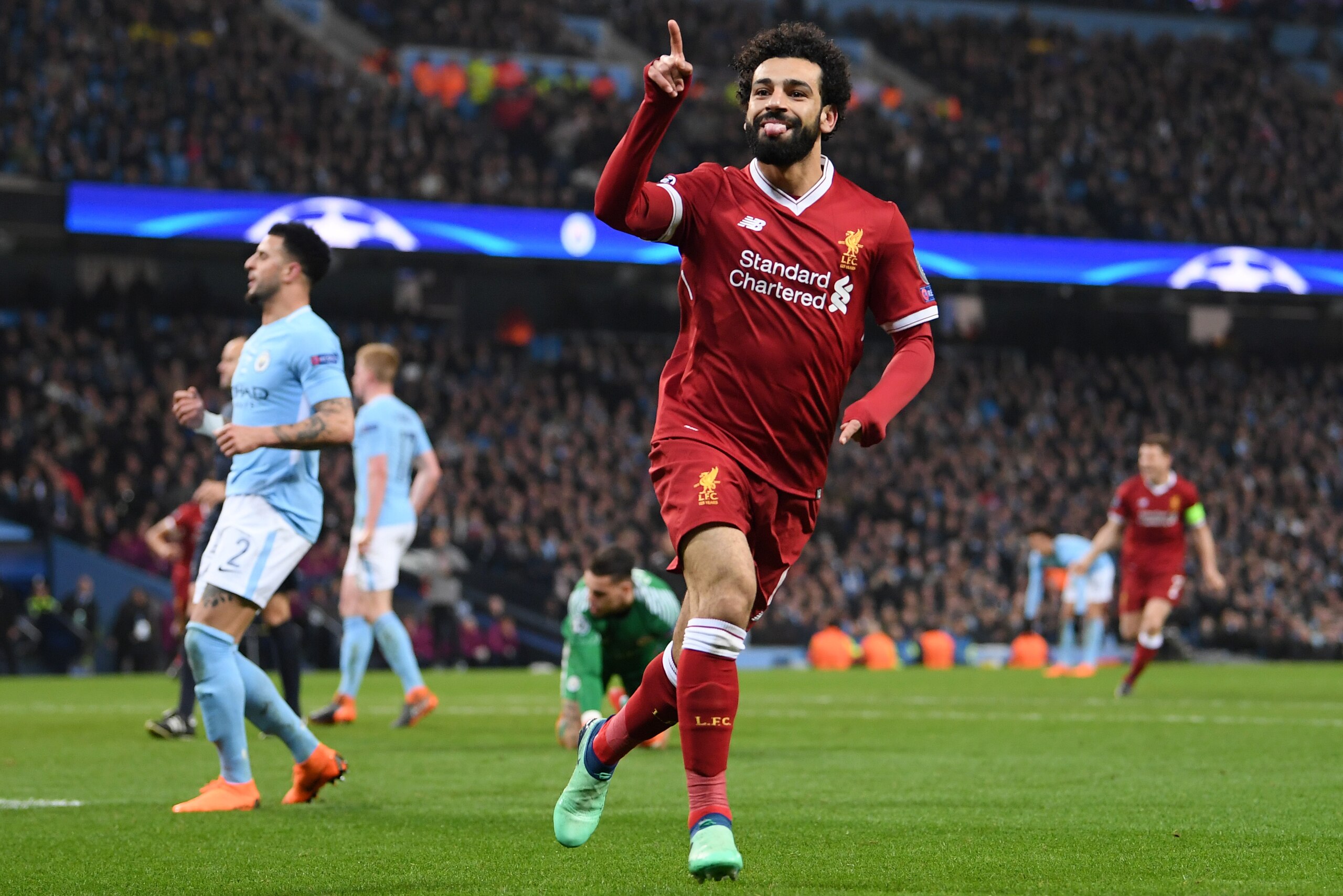 MANCHESTER, ENGLAND - APRIL 10:  Mohamed Salah of Liverpool celebrates scoring the first goal during the Quarter Final Second Leg match between Manchester City and Liverpool at Etihad Stadium on April 10, 2018 in Manchester, England.  (Photo by Laurence Griffiths/Getty Images,)