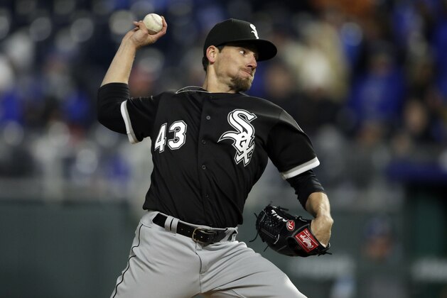 Chicago White Sox relief pitcher Danny Farquhar during a baseball game against the Kansas City Royals at Kauffman Stadium in Kansas City, Mo., Saturday, March 31, 2018. (AP Photo/Orlin Wagner)